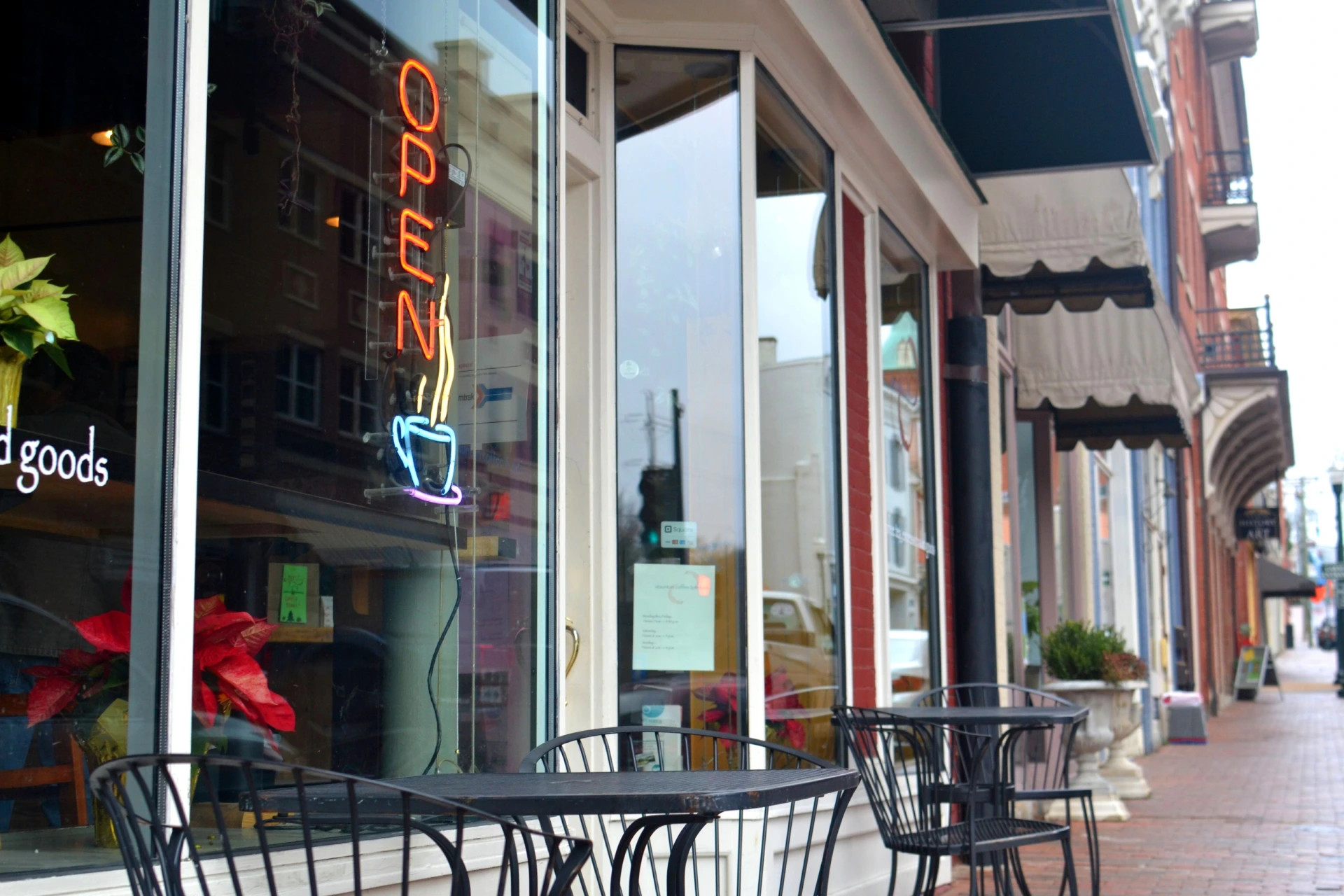 a-neon-open-sign-with-a-steaming-mug-of-coffee-in-2026-01-09-00-35-46-utc