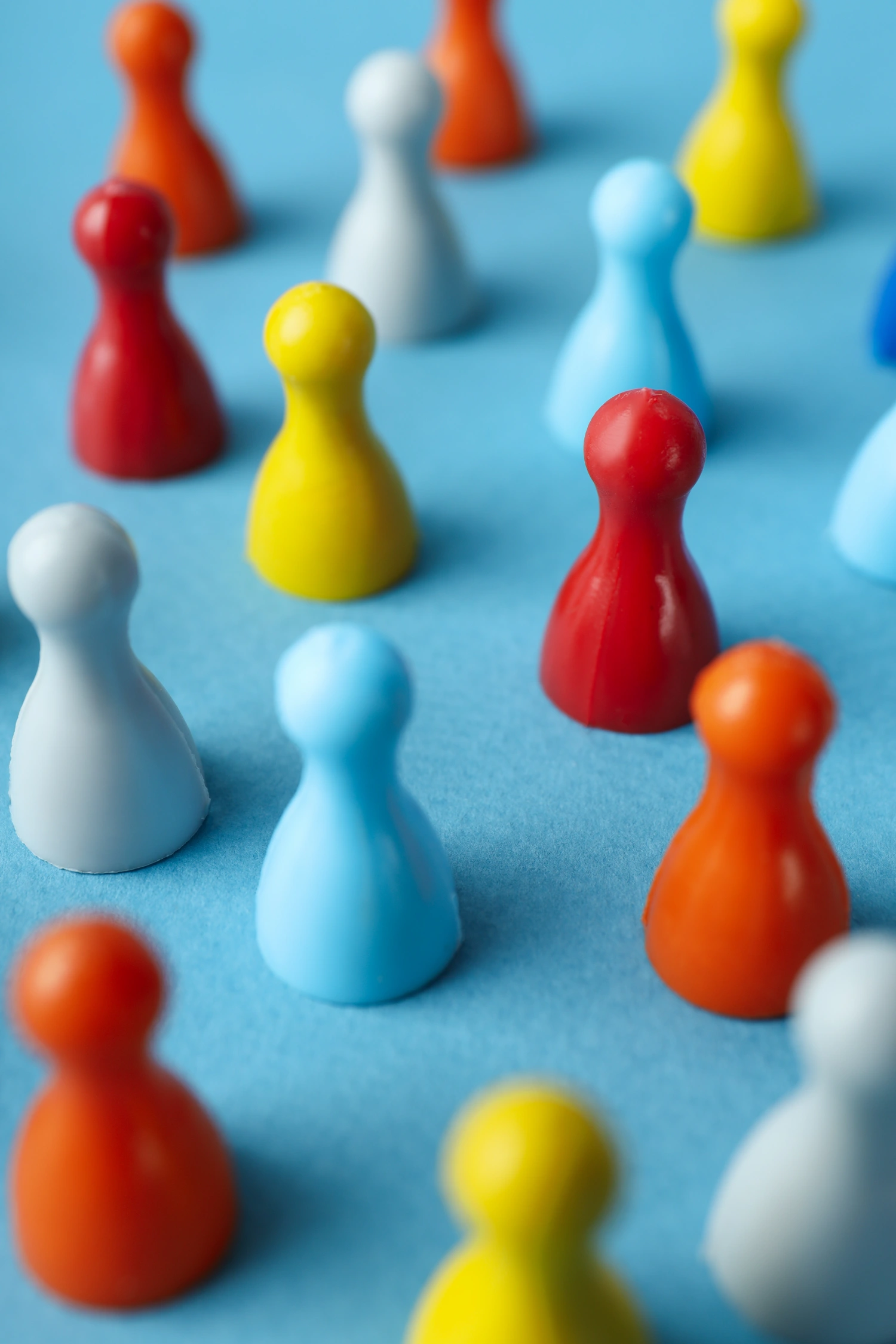 colorful-game-pieces-on-light-blue-background-2026-03-24-23-44-00-utc colorful game pieces on light blue background