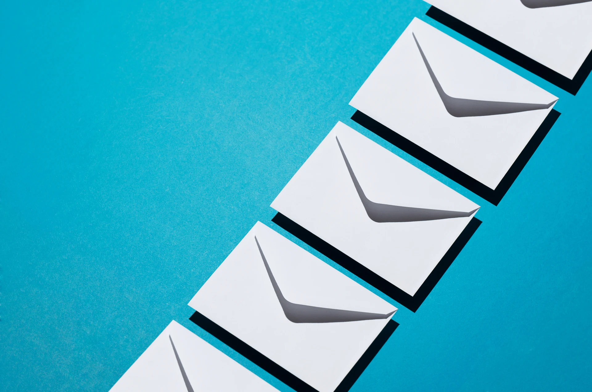 envelopes arranged neatly on a blue background